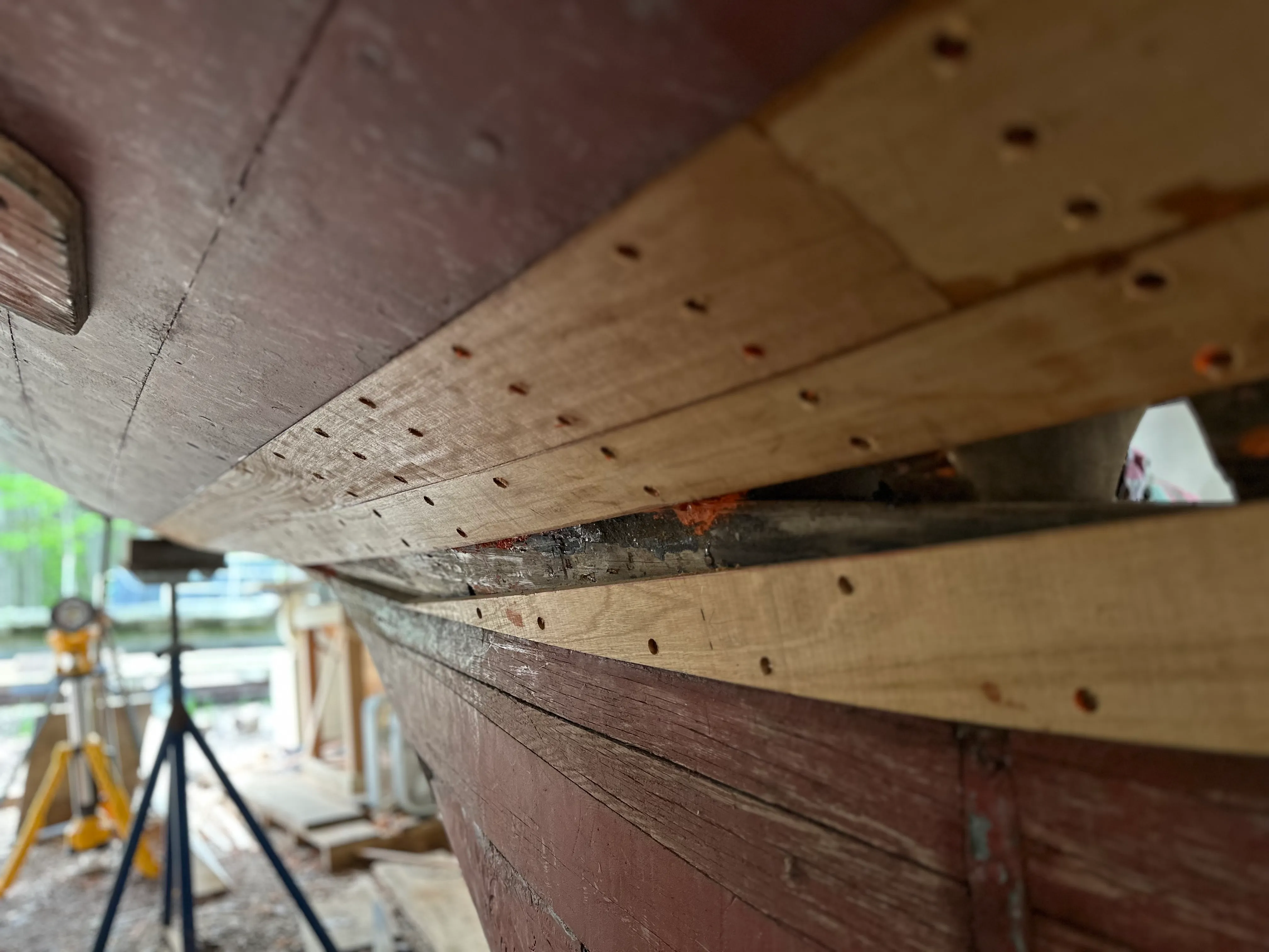 New planks converging sharply at the stern tuck