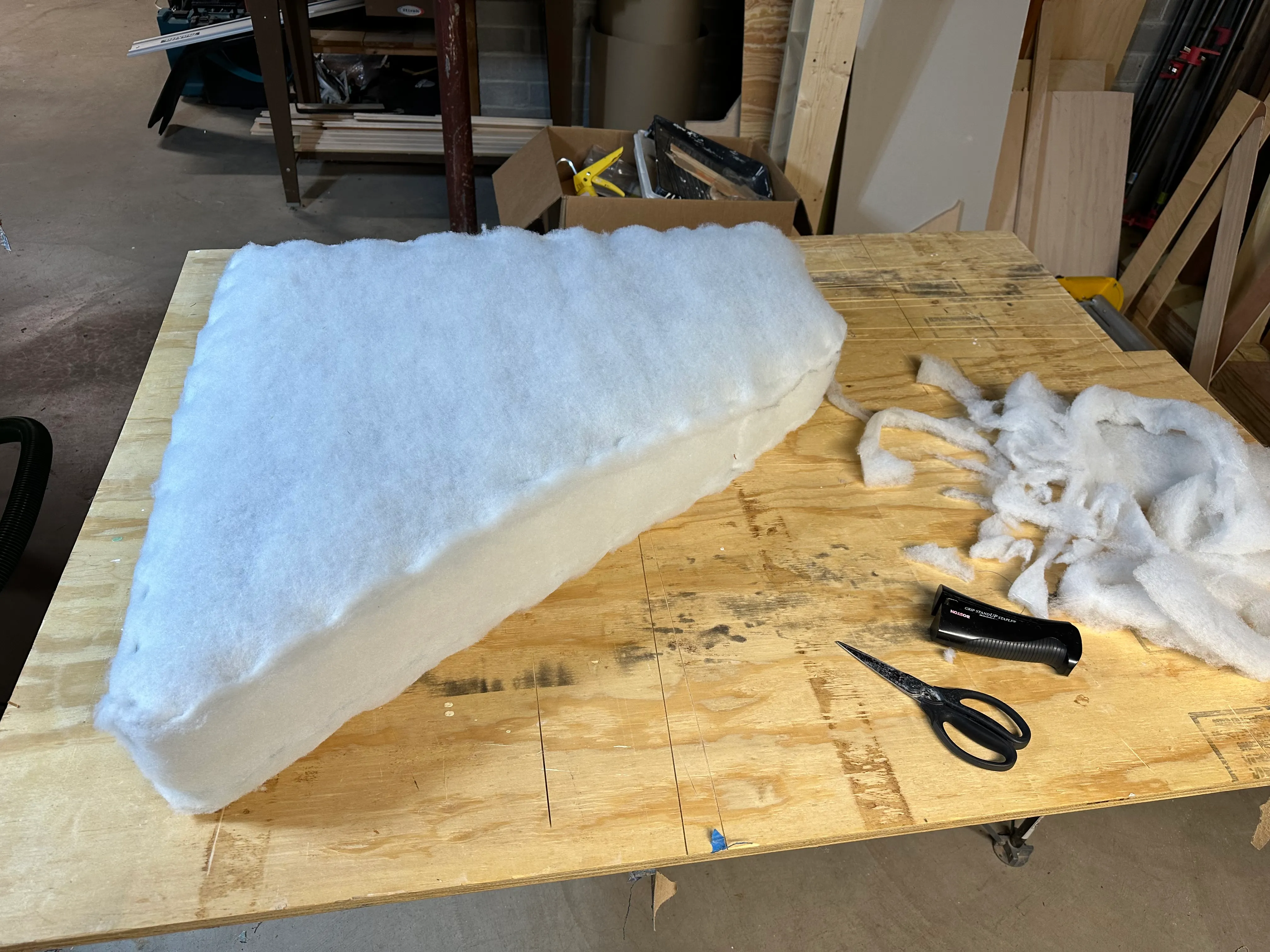 Foam block wrapped in dacron batting