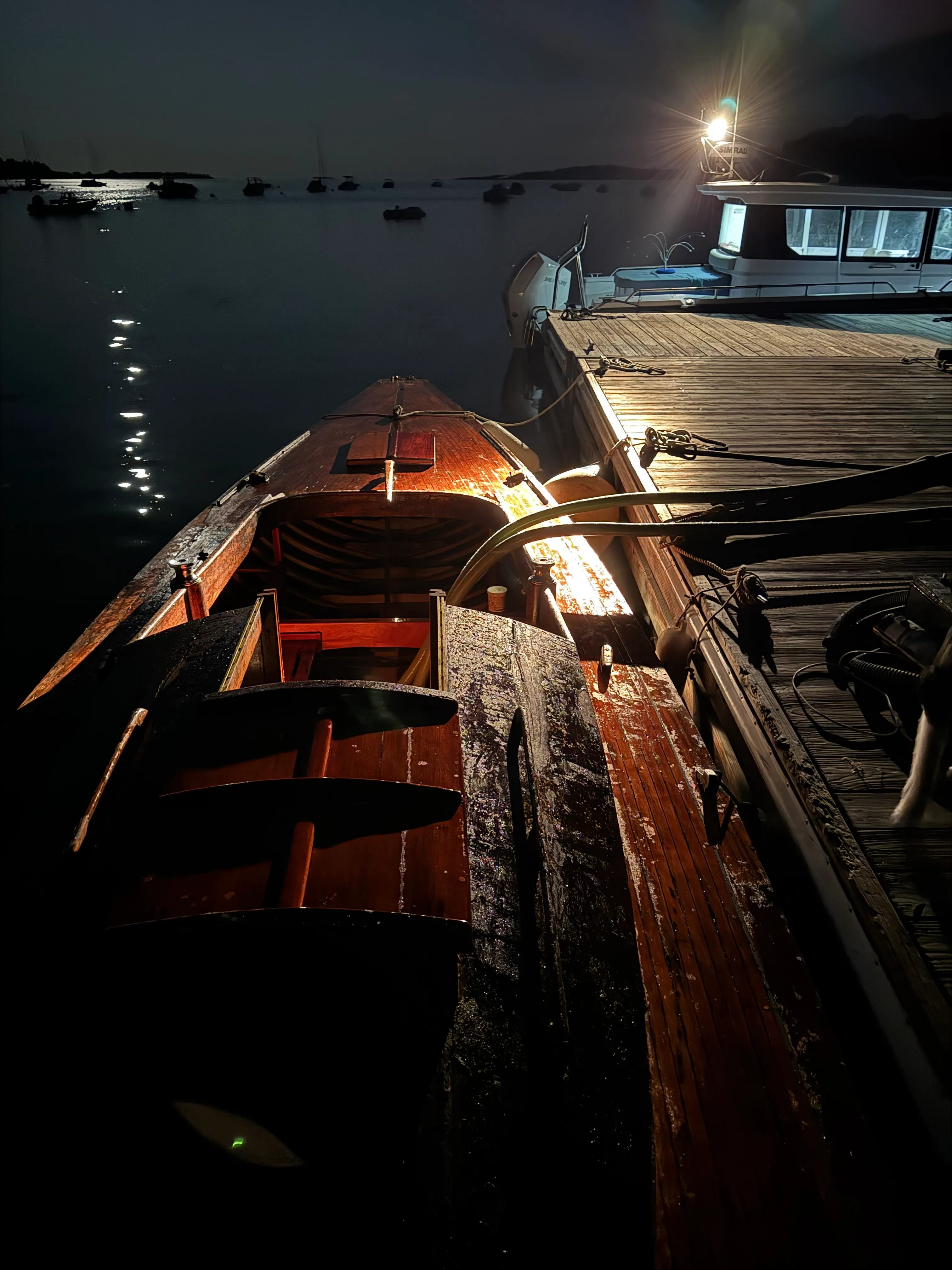 Night view looking into cockpit from dock