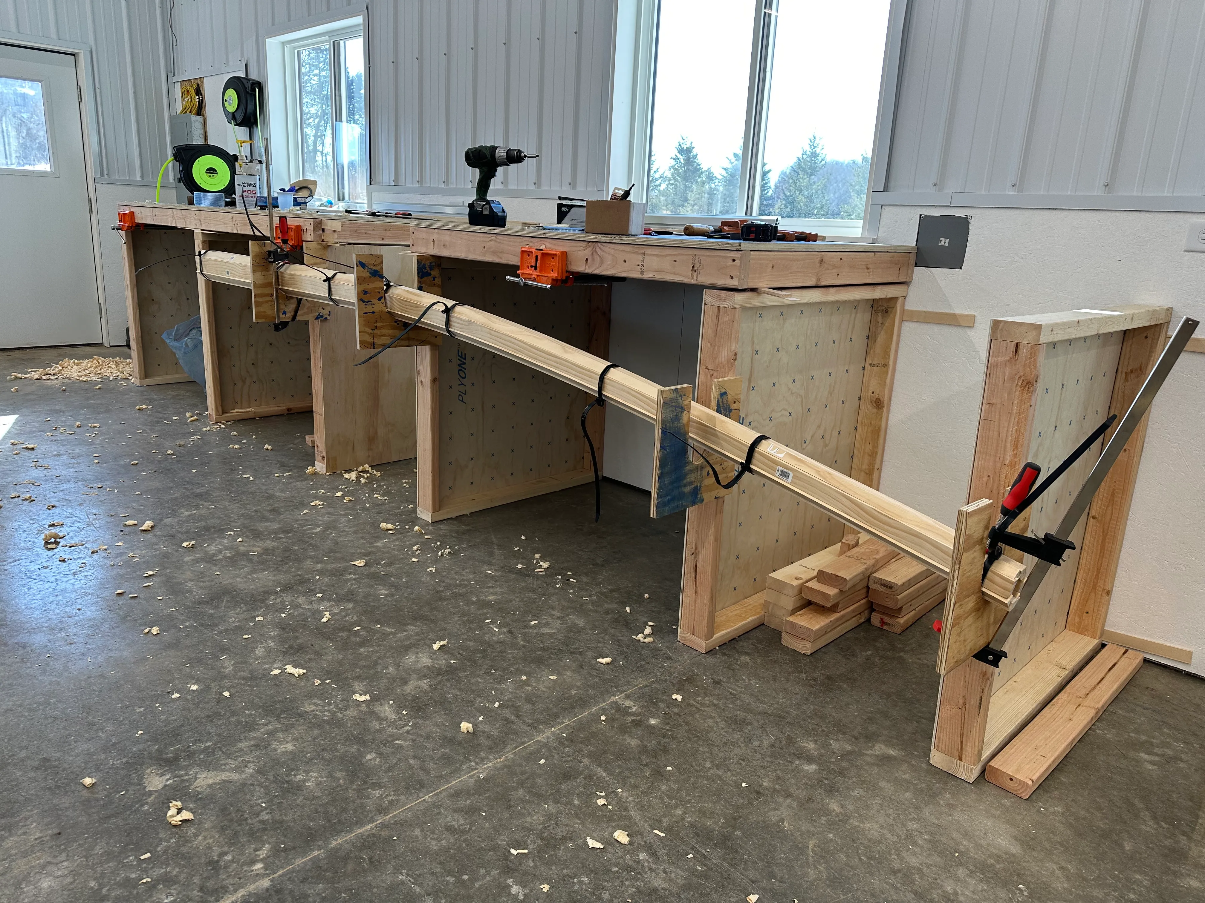 Test section of birdsmouth mast construction in wooden cradles