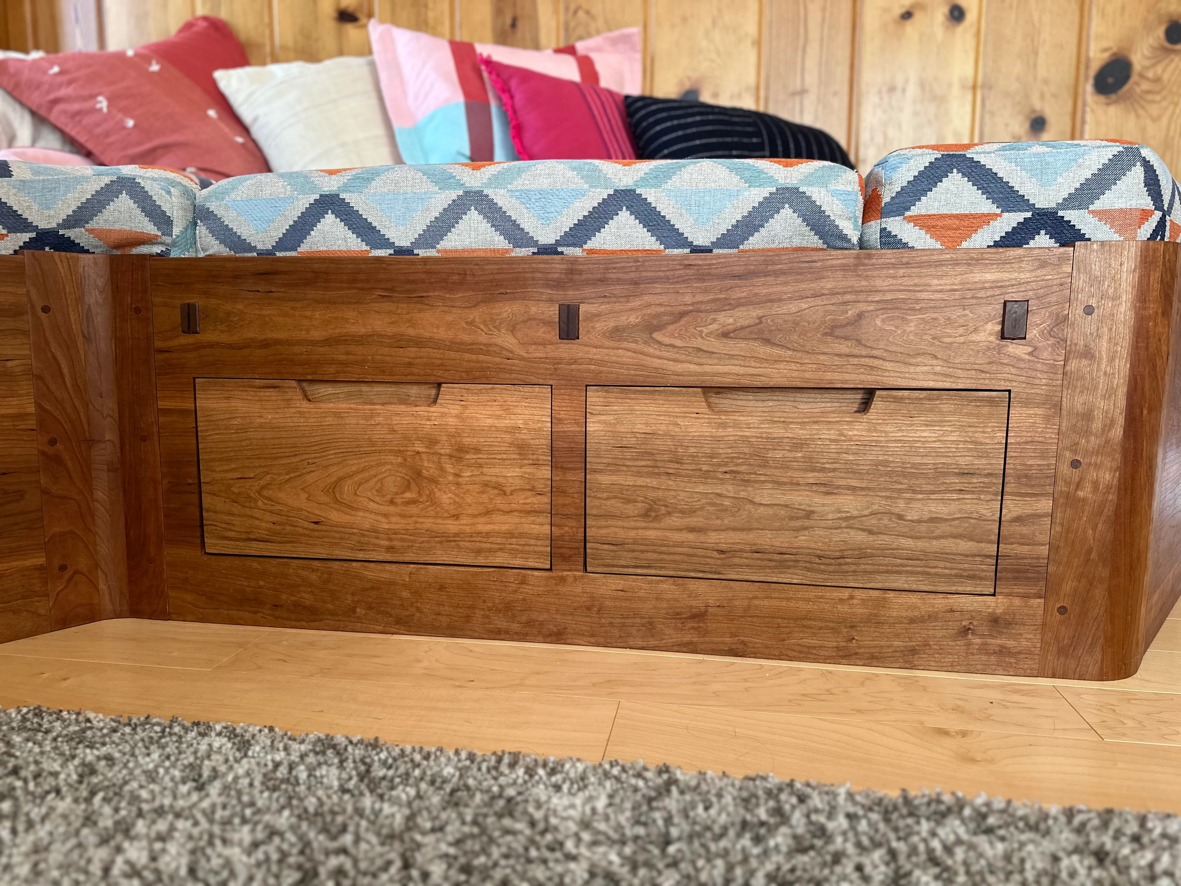 Drawer fronts showing continuous grain and wedged through-tenons