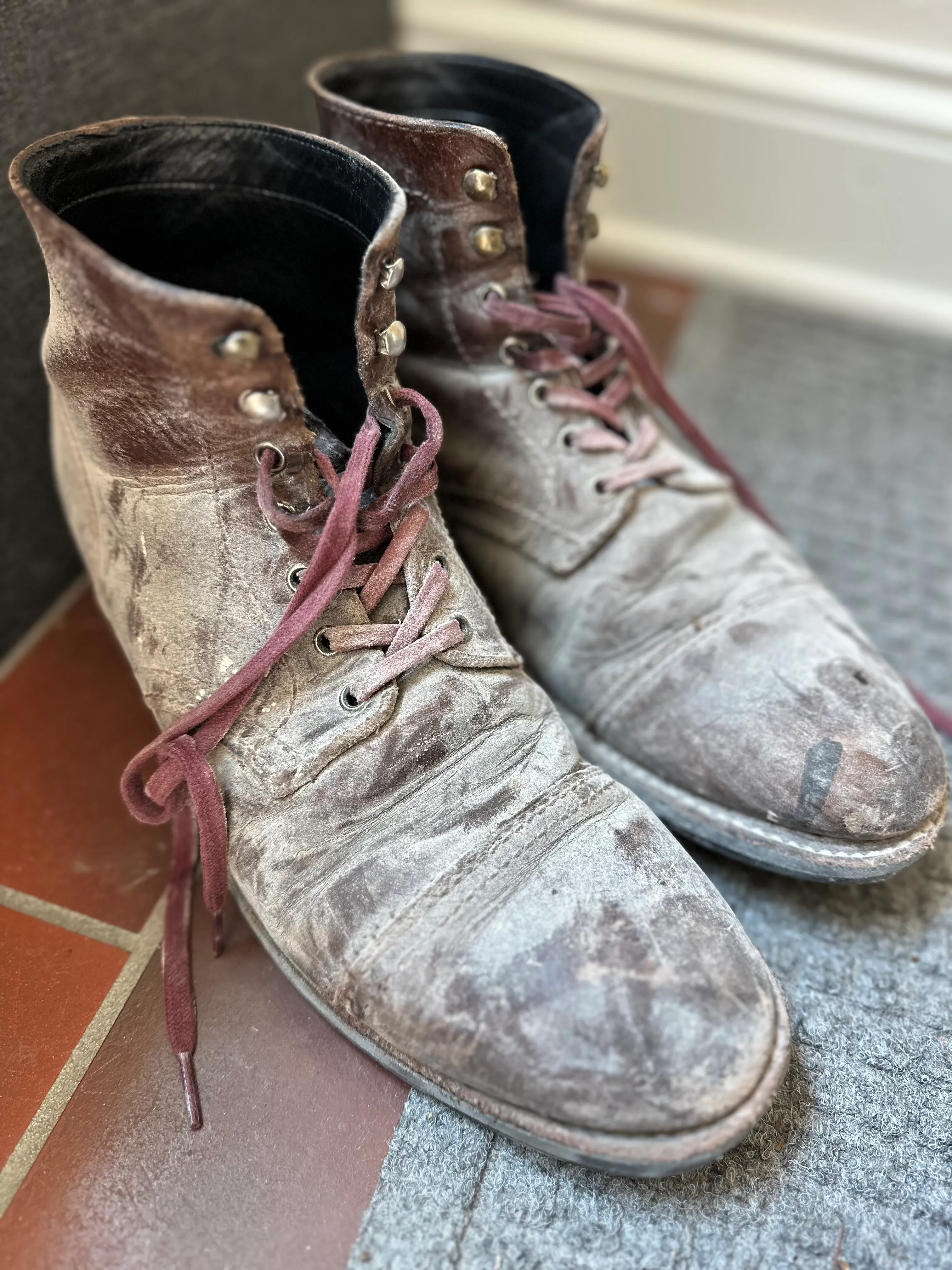Boots covered in spruce dust after sanding