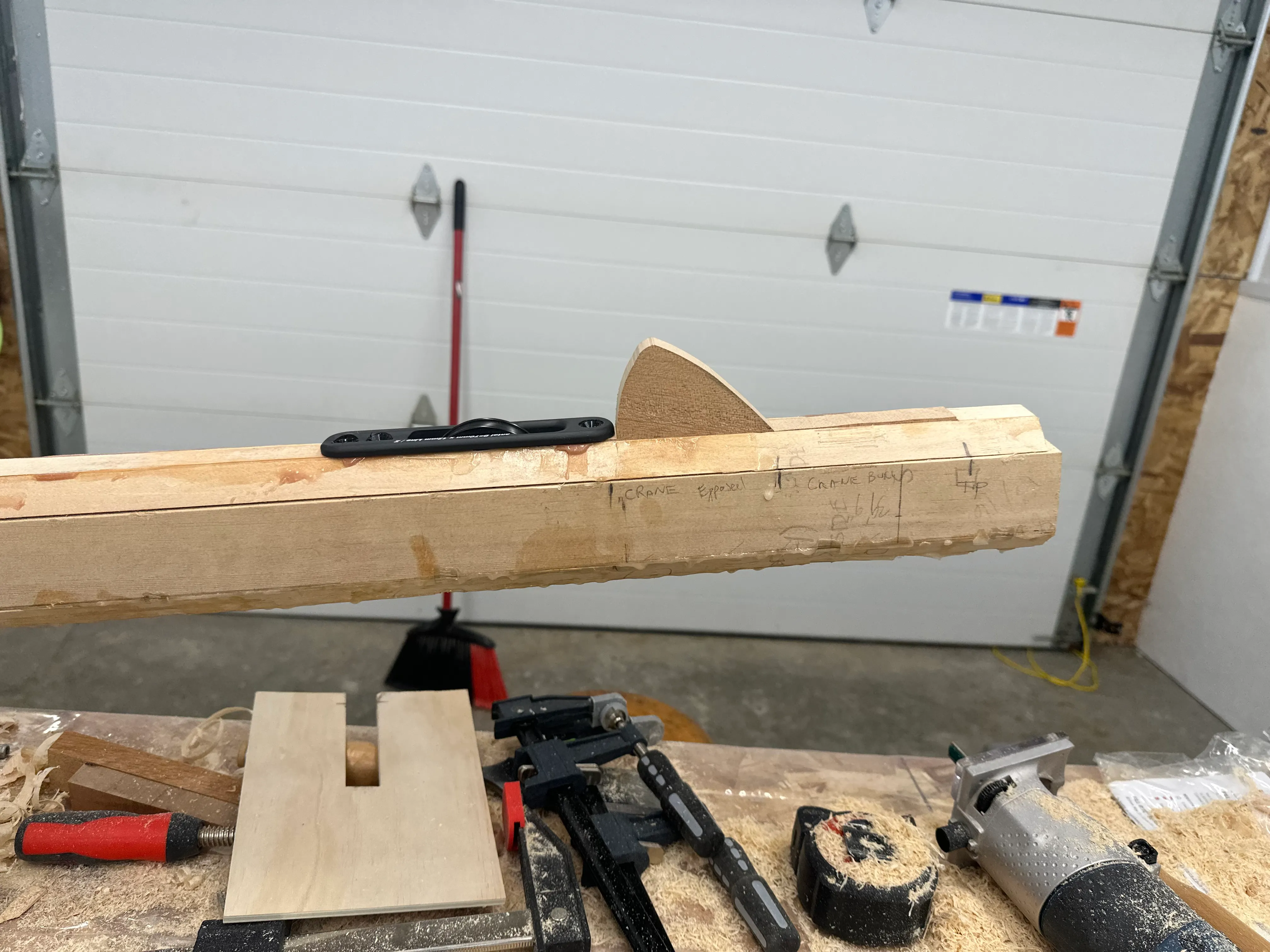 Partially assembled mast showing halyard exit and annotations