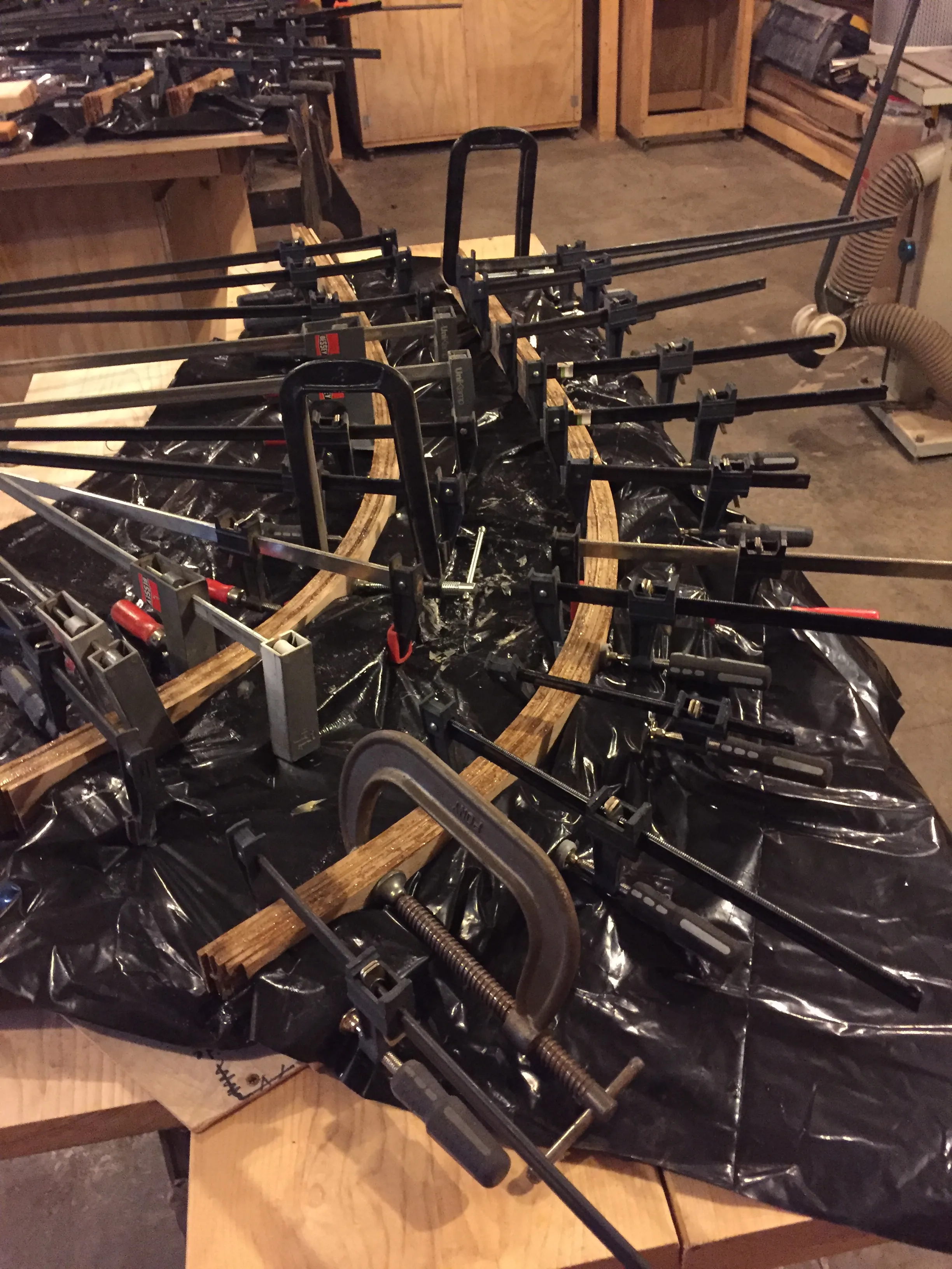 Frame lamination clamped on form