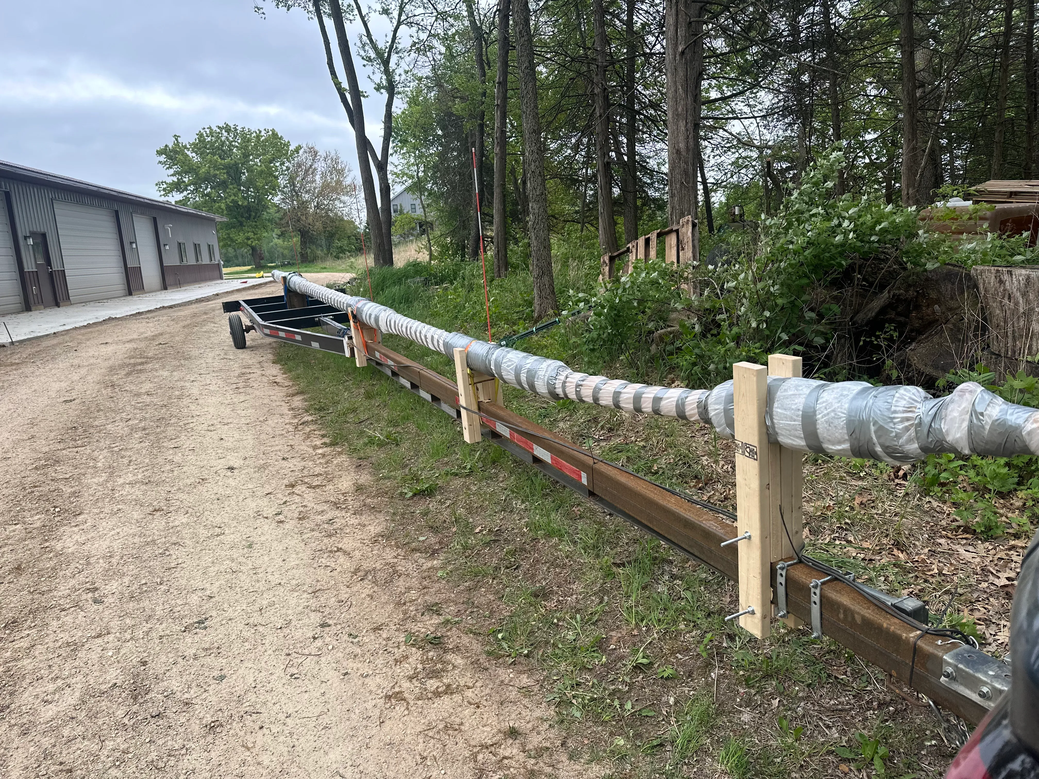 Mast on an extended trailer for transport