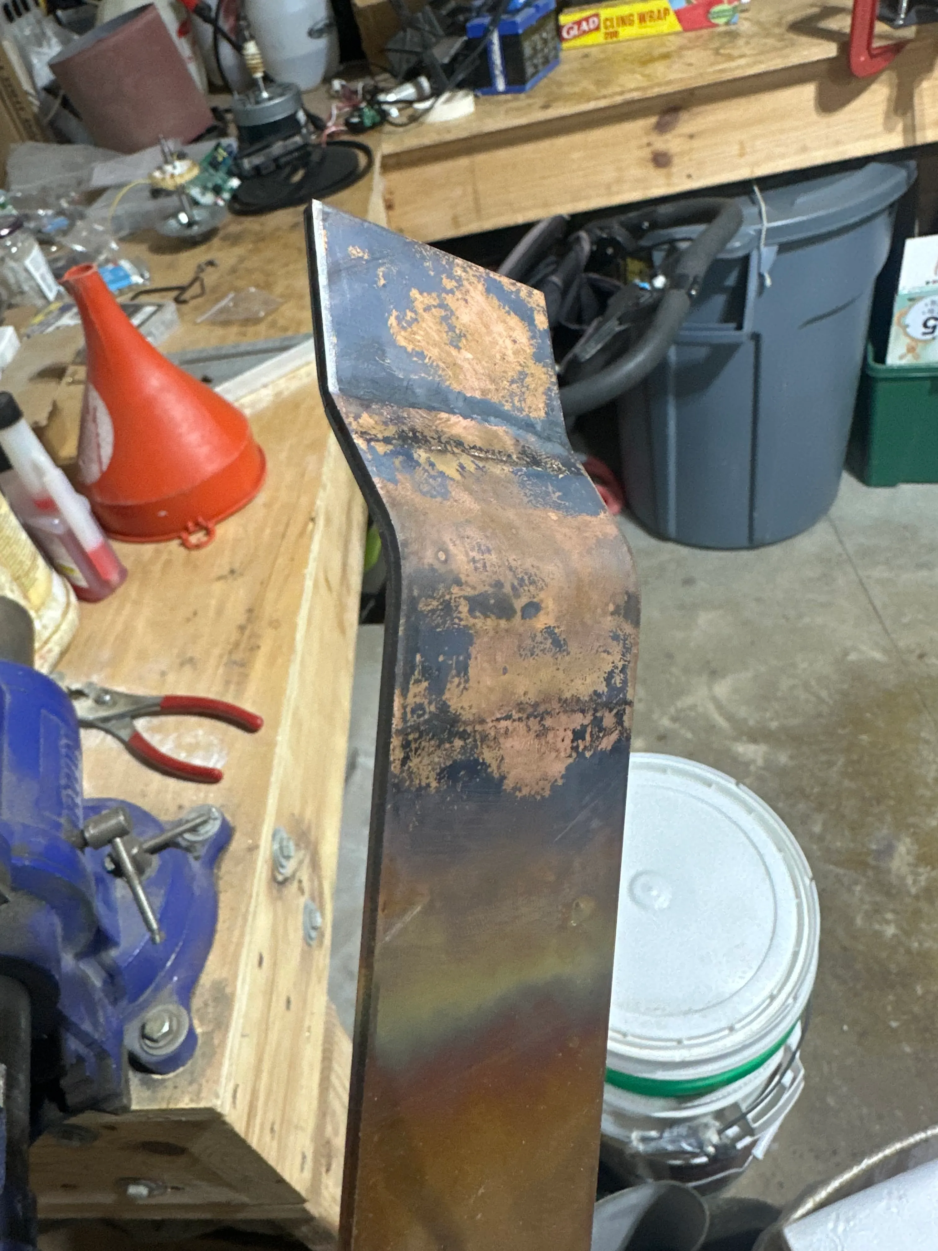 Bronze fitting showing heat discoloration from annealing